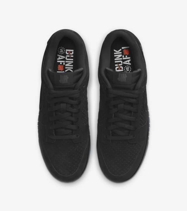 5 on it dunk low x undefeated